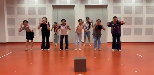 Secondary 1 Drama Club members rehearsing their performance for ISDC.